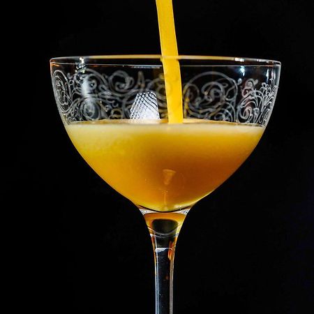 里加老城普尔曼酒店 外观 照片 A glass of orange juice