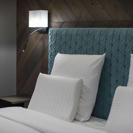 里加老城普尔曼酒店 外观 照片 A bed with a headboard