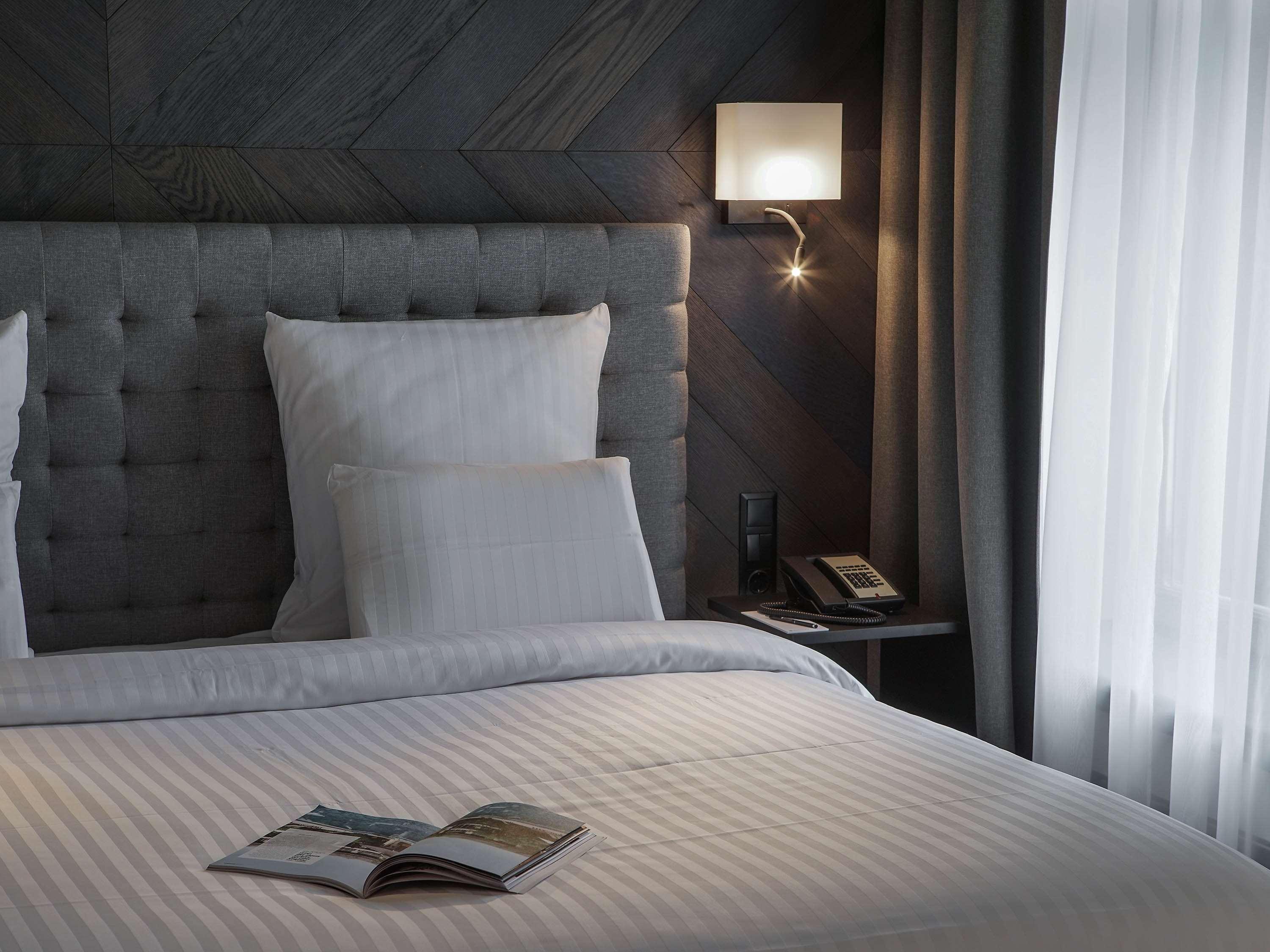 里加老城普尔曼酒店 外观 照片 A bedroom at the hotel