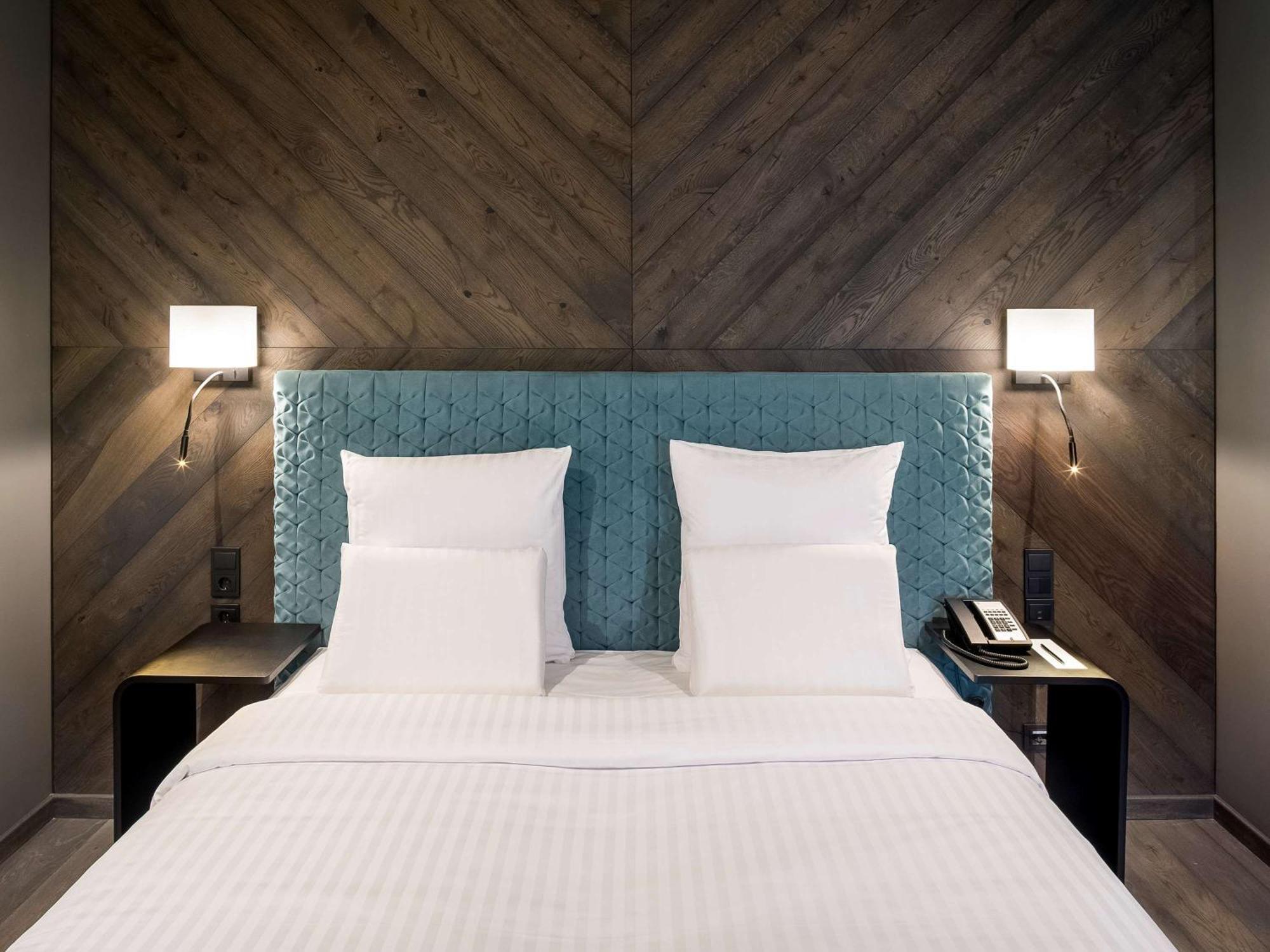 里加老城普尔曼酒店 外观 照片 A bedroom at the hotel